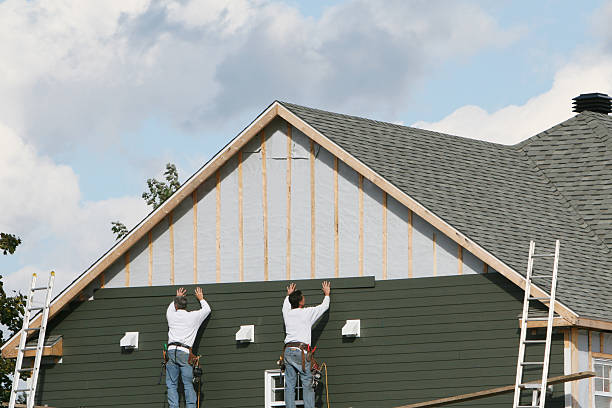 Professional Siding technician working in Geneva, NY